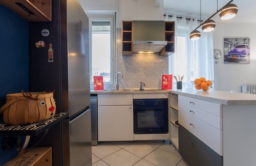 Borgo Dora Apartment | Modern Apartment with Balcony by Wonderful Italy