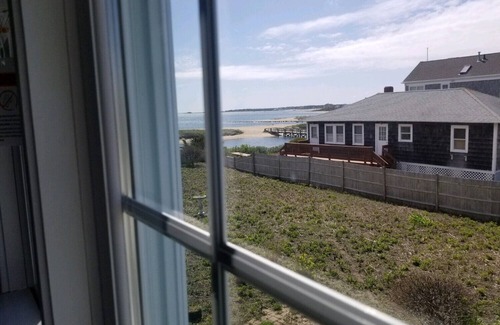 West Yarmouth Condo | Modern beachfront cottage newly renovated steps from warmest beach!