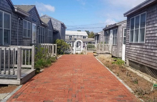 West Yarmouth Condo | Modern beachfront cottage newly renovated steps from warmest beach!