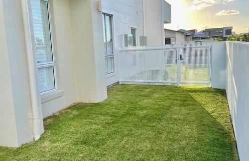 Pelican Waters House | Modern Boho Retreat with Pool, Yard & Beaches Just Minutes Away