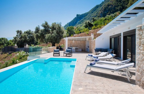 Agios Ioannis Villa | Modern cave villa w/pool, 3 mins walk to the beach