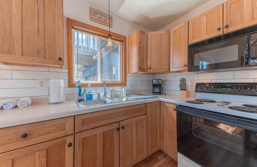 Higgins Lake Ski Chalet | Modern Chalet with Fireplace - close to Higgins Lake!
