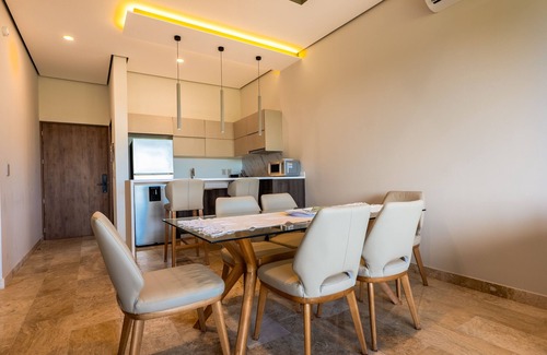 Playa Paraiso Condo | Modern condo with rooftop infinity pool, hot tub, jetted hot tub & WiFi