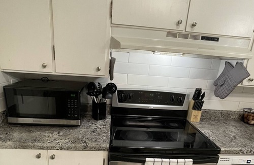 Manchester Apartment | Modern, convenient & clean. Walk to ELM/SNHU arena