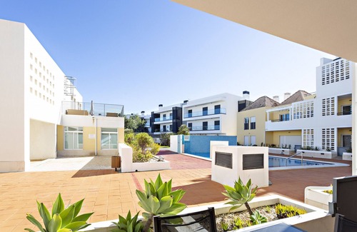 Cabanas Apartment | Modern, cozy apt with pool access