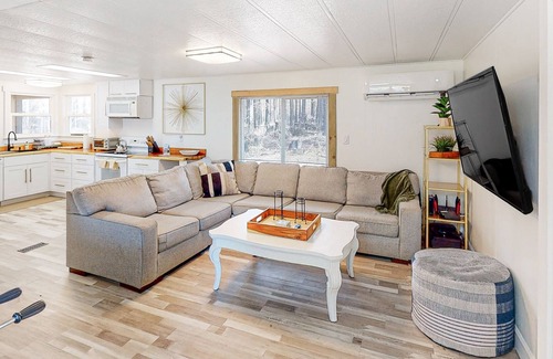 Blue River Cabin | Modern dog-friendly cabin with private deck, foosball, grill, AC, & W/D
