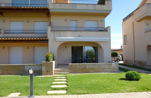 San Jorge House | Modern duplex house overlooking communal pool and gardens at Golf Panoramica.
