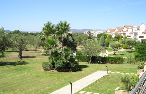 San Jorge House | Modern duplex house overlooking communal pool and gardens at Golf Panoramica.