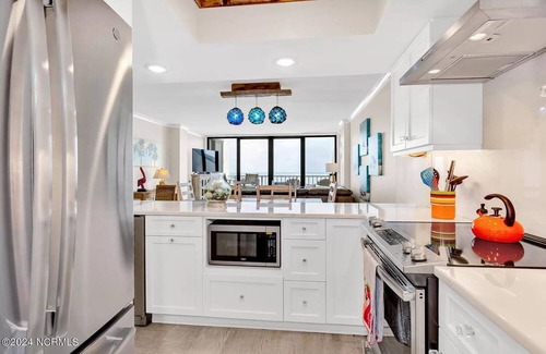 Wrightsville Beach Condo | Modern Elegance Meets Coastal Escape: Explore Newly Updated 2 BR Penthouse Condo