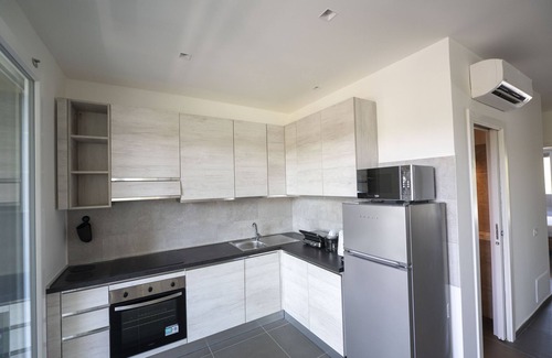 Zona XXX Castel Fusano Apartment | Modern Family 2 BR Apartment in Residential Area