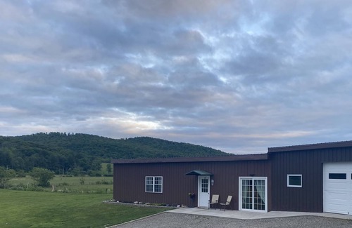 Caroline House | Modern farmhouse centrally located 25 minutes from Ithaca and the Finger Lakes.