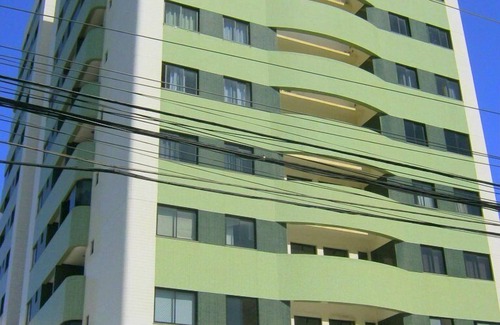 Armacao Apartment | Modern fully-furnished apartment with swimming pool, gym and game room.