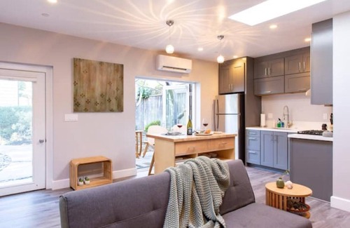 Tamalpais-Homestead Valley House | Modern Garden View Home w/free parking, unique art & furniture: a Superhost