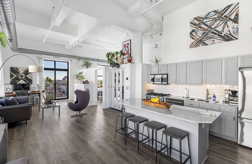 University Village / Little Italy Condo | Modern Historic Loft 19ft Ceilings, Gym, Heated Parking, Skyline Views + Balcony
