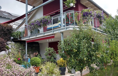 Hergensweiler Apartment | Modern holiday apartment with a large, partially covered terrace