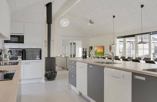 Frørup House | Modern holiday home with sea views and pool and activity room, WiFi and oven