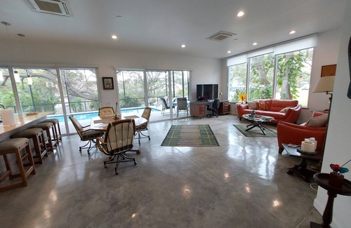 Palm Harbor House | Modern Jewel, 10 Min. drive to Honeymoon Island, Sleeps 4, Lap Pool, WorkoutRoom