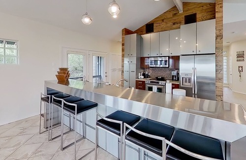 Lago Vista House | Modern lake-view retreat with balcony, deck, Peloton, central AC, & washer/dryer