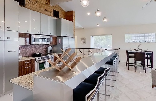 Lago Vista House | Modern lake-view retreat with balcony, deck, Peloton, central AC, & washer/dryer