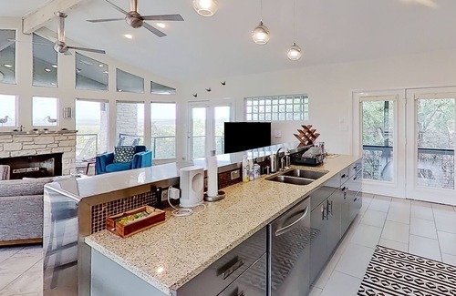 Lago Vista House | Modern lake-view retreat with balcony, deck, Peloton, central AC, & washer/dryer
