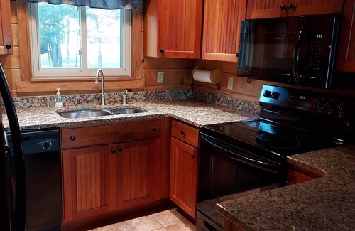 Oakland Cabin | Modern lakeside log cabin on pristine East Pond Oakland Maine's Belgrade Lakes