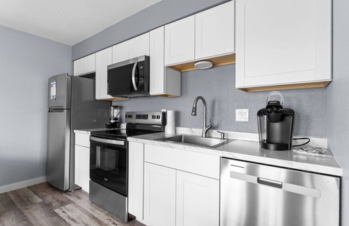 Indian Point Condo | Modern Lakeview Condo, Swim Up Bar Pool, Tiki Bar, Marina & More!