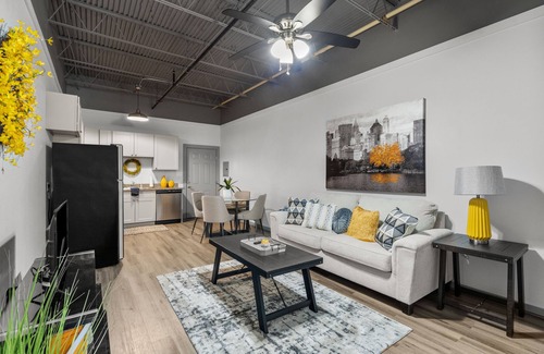 Baytown Apartment | Modern Loft Vibes Exposed Brick + Cozy Design
