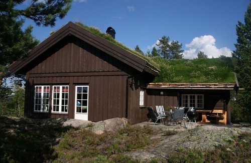 Flesberg Cabin | Modern log cabin on Blefjell