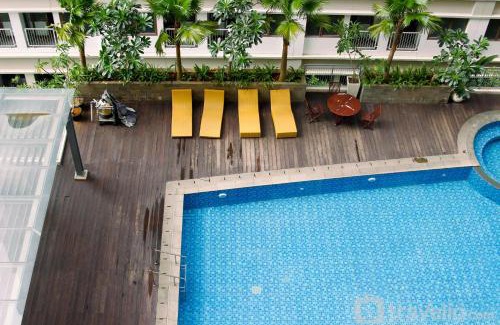 Duren Sawit Apartment | Modern Look Studio Room at Gateway Park LRT City Jatibening Apartment By Travelio