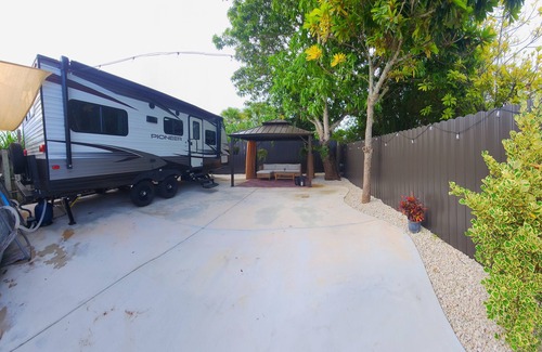 Homestead House | Modern mobile home with pool and private patio.