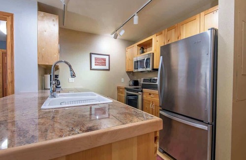Driggs Condo | Modern Remodel Top Level Corner Unit with Hot Tubs