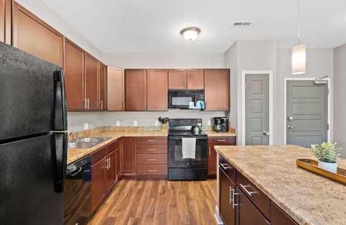 West Des Moines Apartment | Modern Retreat with Garage, Gym, and Pool