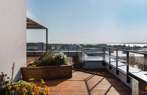 Moss Municipality Condo | Modern Scandinavian apartment with two balconies, roof top terrace and parking.