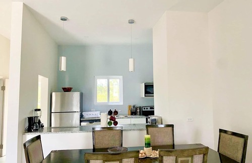 Jimmy Hill Condo | Modern Spacious Villa steps away from a beautiful private beach