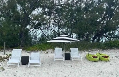 Jimmy Hill Condo | Modern Spacious Villa steps away from a beautiful private beach