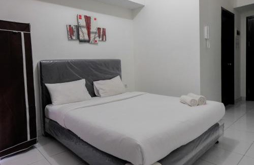 Pagedangan Apartment | Modern Studio Casa De Parco Apartment By Travelio