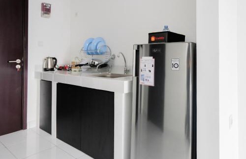 Pagedangan Apartment | Modern Studio Casa De Parco Apartment By Travelio