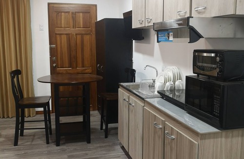 San Antonio de Belen Apartment | Modern Studio Clean Safe Area Fast Wifi with Patio