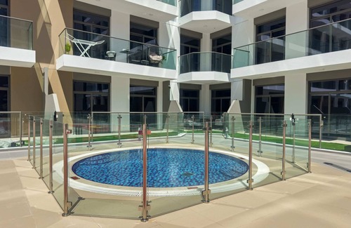 Dubai Apartment | Modern Studio in residence with pool gym and paddl