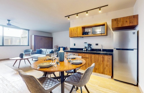 Gonzalo Guerrero Condo | Modern studio with roof lounge, pool, firepit & partial AC - walk to bars/dining