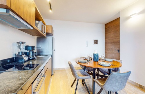Gonzalo Guerrero Condo | Modern studio with roof lounge, pool, firepit & partial AC - walk to bars/dining