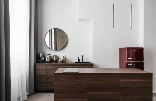 Stare Miasto Apartment | Modern Style Meets History in Unique Apartment