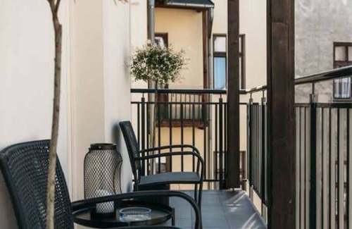 Stare Miasto Apartment | Modern Style Meets History in Unique Apartment