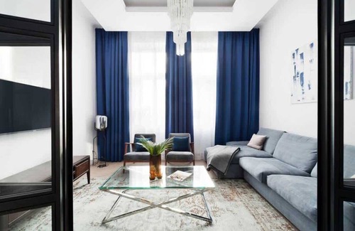 Stare Miasto Apartment | Modern Style Meets History in Unique Apartment