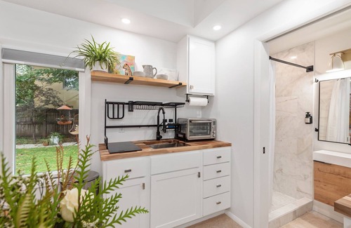 Maple Ridge Cottage | Modern Sunset cottage in Tulsa walk to gathering place downtown and Utica square
