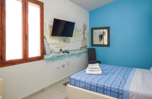 Orgosolo Apartment | Modern vacation home in charming side street of Orgosolo.