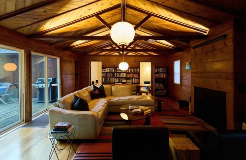 Hacienda House | Modern wooded gem with fast WiFi, charming deck, fireplace, W/D & central AC