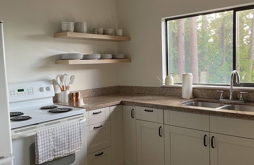Sunshine Coast Cottage | Modernized 2 bedroom rustic cottage with fireplace