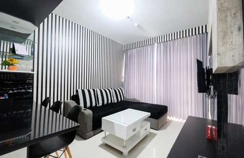 Bintaro Apartment | Monochrome 1BR Lexington Apartment By Travelio