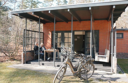 Norg House | Monumental 4-person bungalow, built under the architecture of the Amsterdam School with unique details.